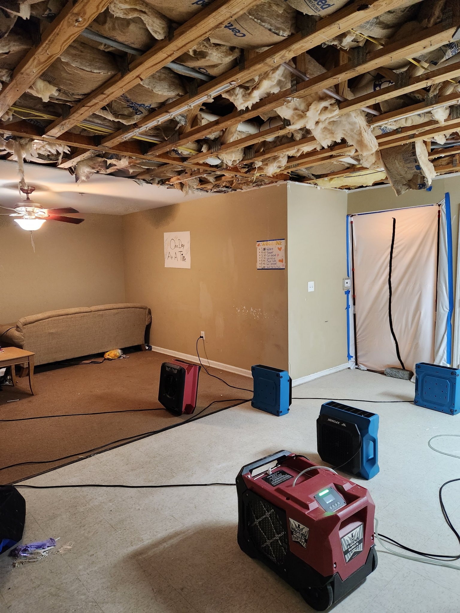 Ceiling demolition and structural drying with dehumidifier and air movers