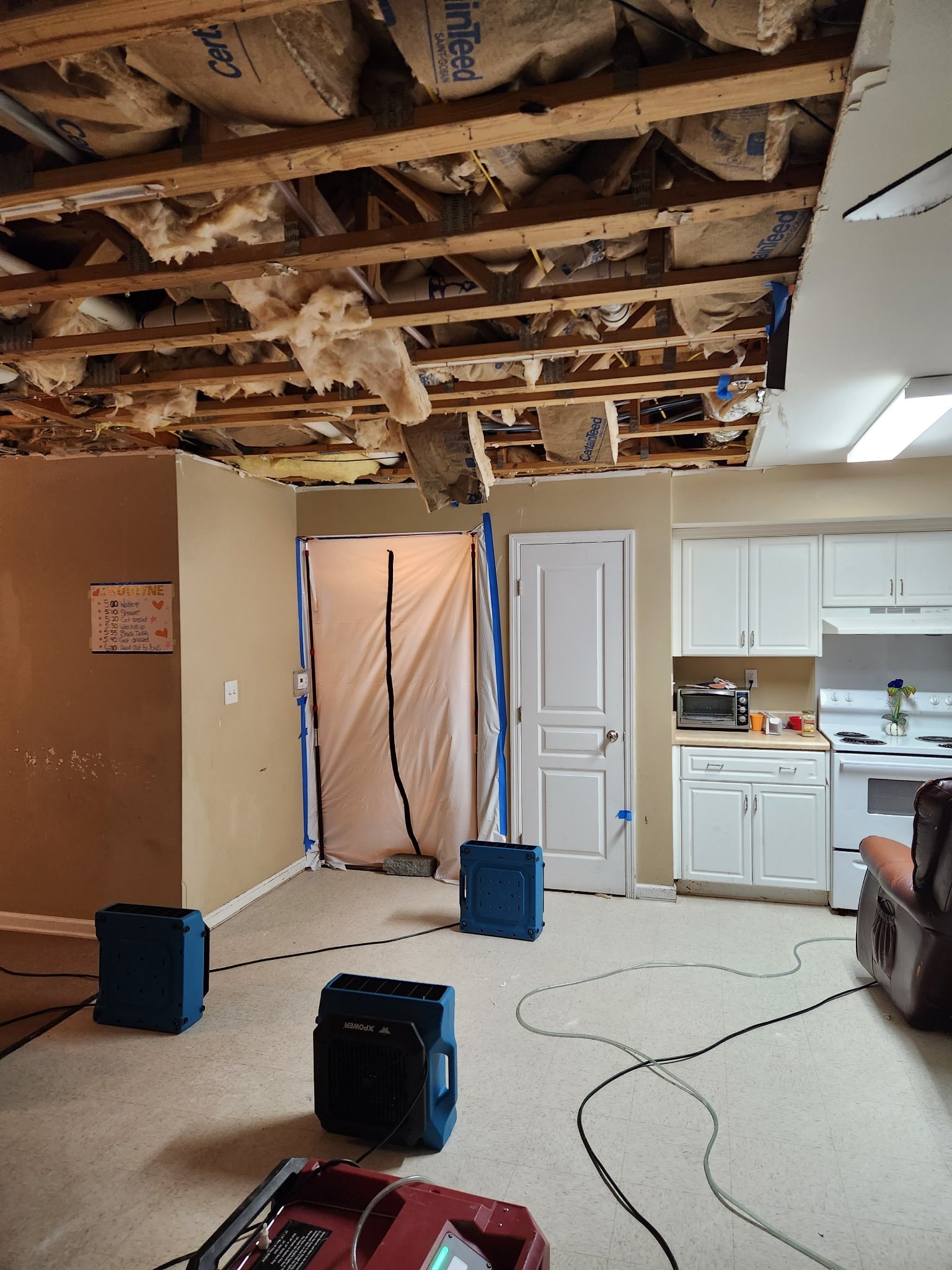 Open ceiling demolition with containment and drying equipment