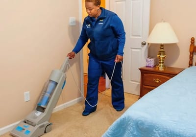 Professional deep carpet cleaning with extraction equipment